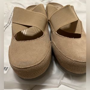 Crocs size 10 beige slip on